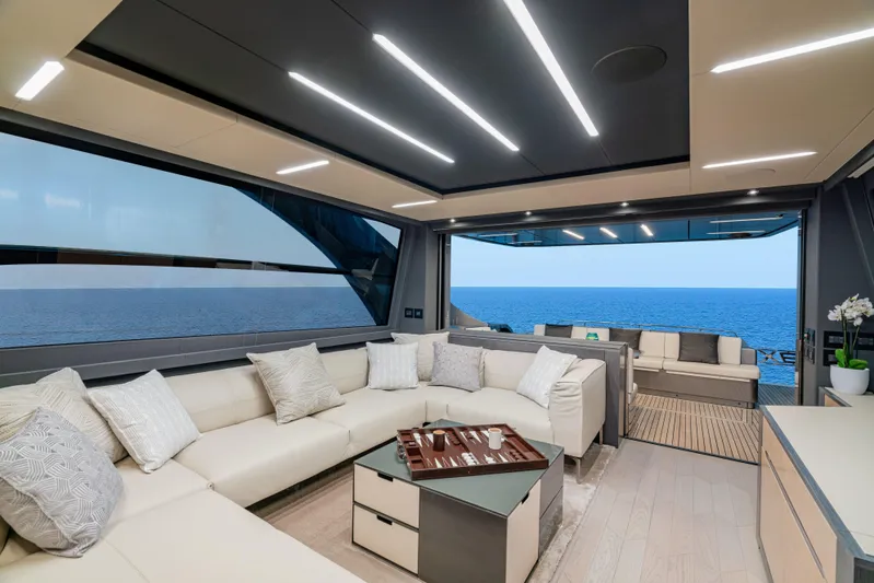Silver Bullet Yacht Photos Pics Luxurious interior of 2022 Pershing 8X yacht with ocean view and modern design.