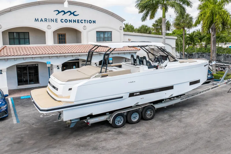  Yacht Photos Pics 2025 De Antonio Yachts D36 OPEN on trailer at Marine Connection dealership.