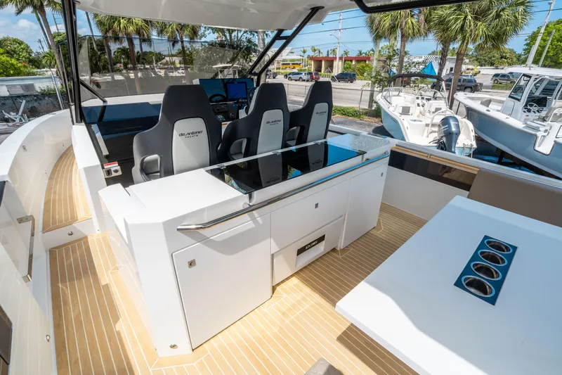  Yacht Photos Pics 2025 De Antonio Yachts D36 OPEN interior with sleek seating and modern design.