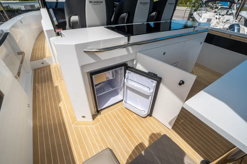  Yacht Photos Pics Open mini fridge on 2025 De Antonio Yachts D36 OPEN deck, showcasing modern design and functionality.