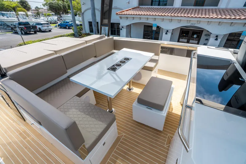  Yacht Photos Pics Luxurious seating area on 2025 De Antonio Yachts D36 OPEN with modern design and table.