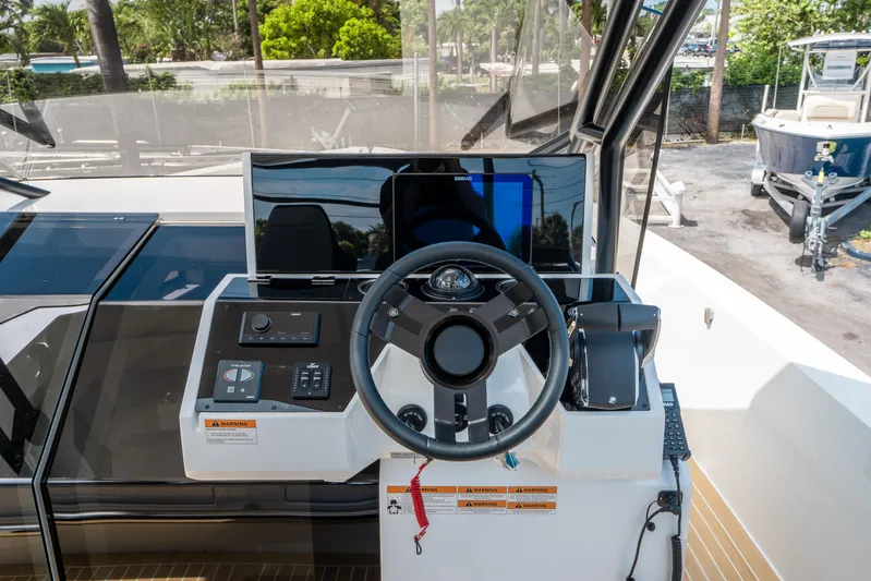  Yacht Photos Pics Helm of 2025 De Antonio Yachts D36 OPEN, featuring modern controls and navigation equipment.