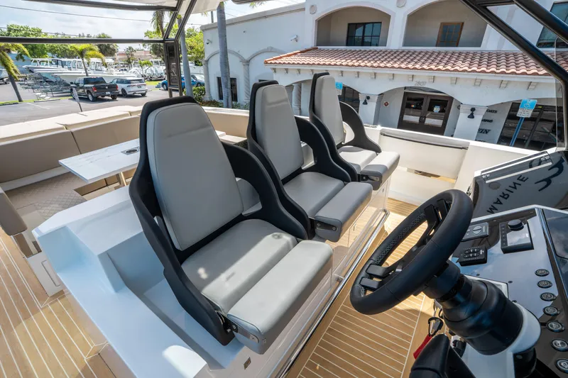  Yacht Photos Pics Luxury seating on 2025 De Antonio Yachts D36 OPEN, featuring modern helm and spacious deck.