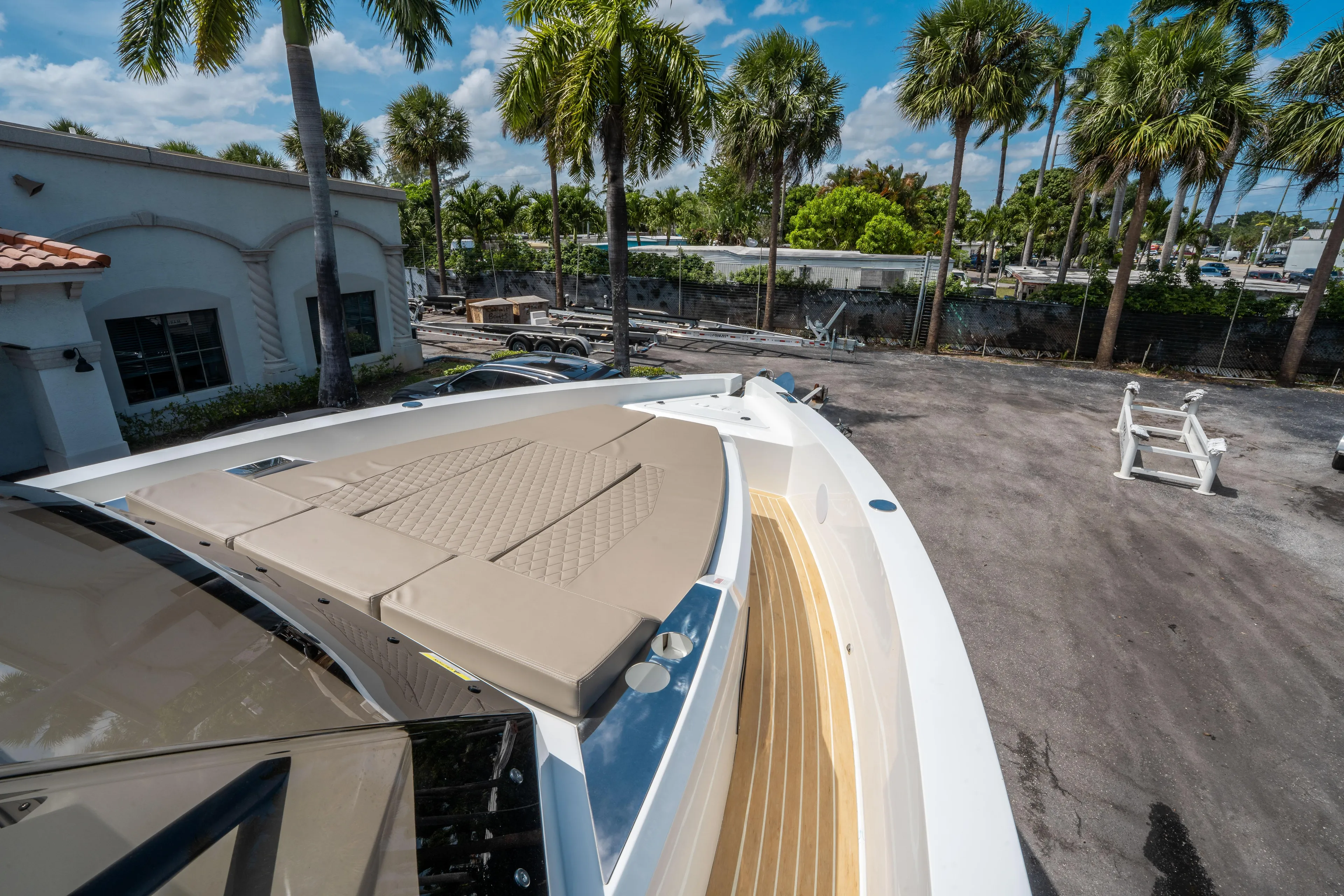  Yacht Photos Pics 2025 De Antonio Yachts D36 OPEN with sun deck, surrounded by palm trees.