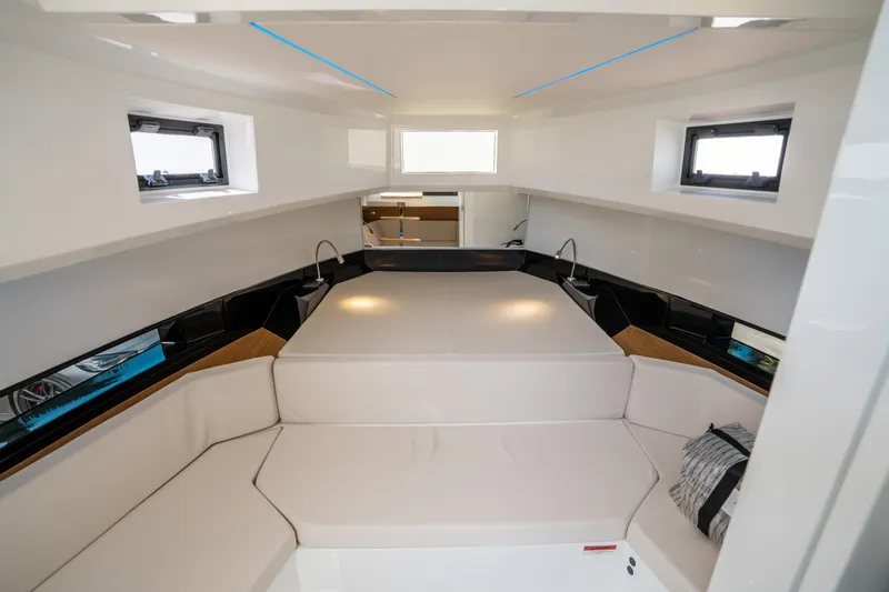  Yacht Photos Pics Luxurious interior of 2025 De Antonio Yachts D36 OPEN with modern seating and windows.