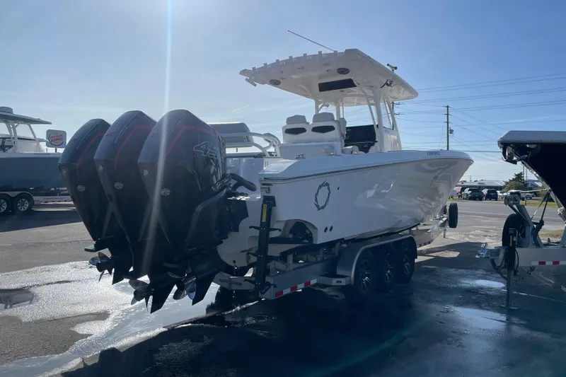  Yacht Photos Pics 2020 Fountain 38 Center Console boat with triple outboard engines on a trailer.