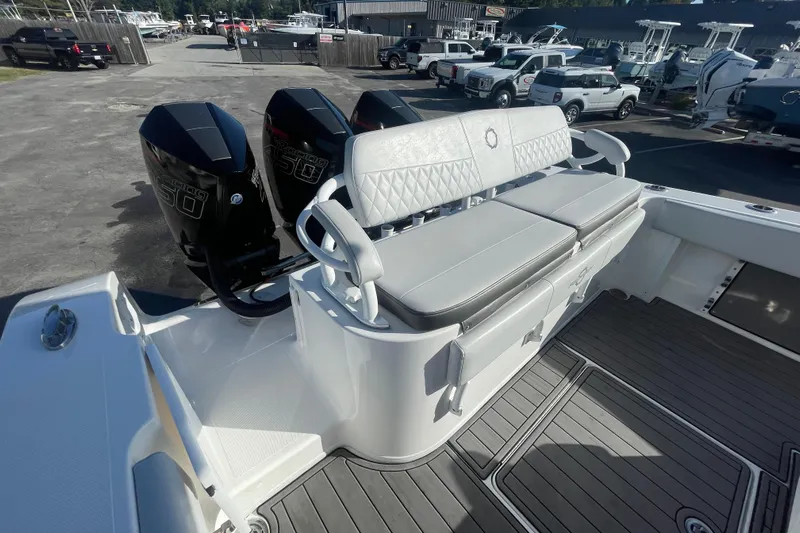  Yacht Photos Pics 2020 Fountain 38 Center Console boat with triple Mercury 450 engines and cushioned seating.