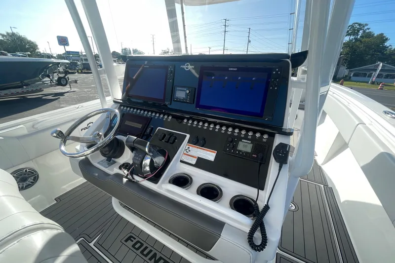  Yacht Photos Pics 2020 Fountain 38 Center Console boat dashboard with advanced navigation systems.