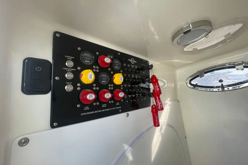  Yacht Photos Pics Control panel of a 2020 Fountain 38 Center Console boat interior.
