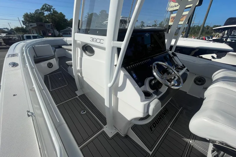  Yacht Photos Pics 2020 Fountain 38 Center Console boat with sleek design and modern dashboard.