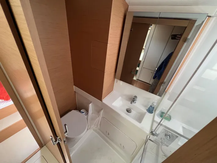 Sia Yacht Photos Pics Modern bathroom in 2022 Excess XCS 11 yacht with sleek design and wooden accents.