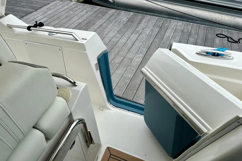  Yacht Photos Pics 2022 Tiara Yachts 38 LS interior with open door and dock view.
