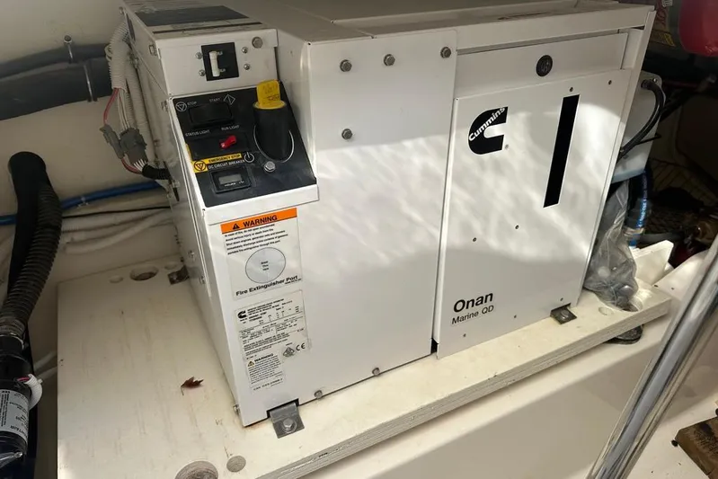  Yacht Photos Pics Cummins Onan Marine QD generator in 2022 Tiara Yachts 38 LS engine room.