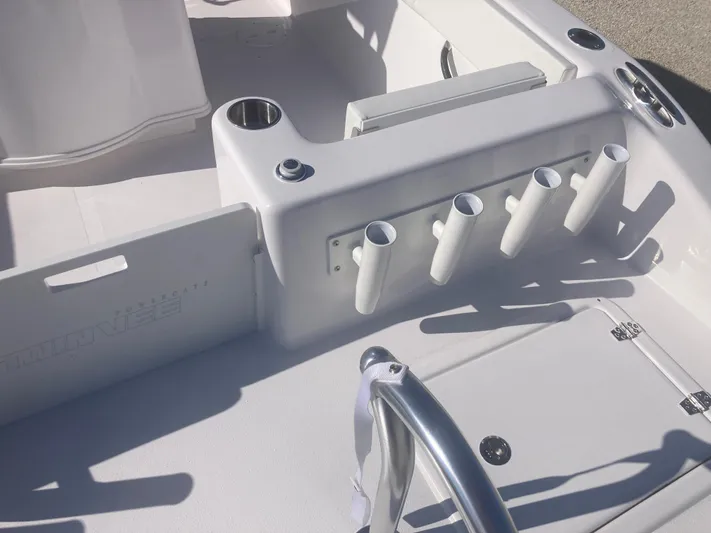  Yacht Photos Pics 2025 Twin Vee 280GFX2 boat interior with rod holders and cup holder.