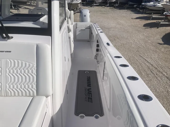  Yacht Photos Pics 2025 Twin Vee 280GFX2 boat interior with sleek white design and modern features.