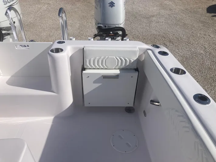  Yacht Photos Pics 2025 Twin Vee 280GFX2 boat interior with seating and storage compartments.