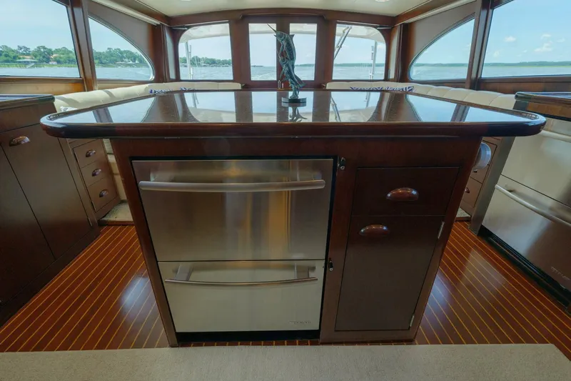 Salemwolf Yacht Photos Pics Luxurious interior of a 2000 Garlington 61 C yacht with elegant wood cabinetry.