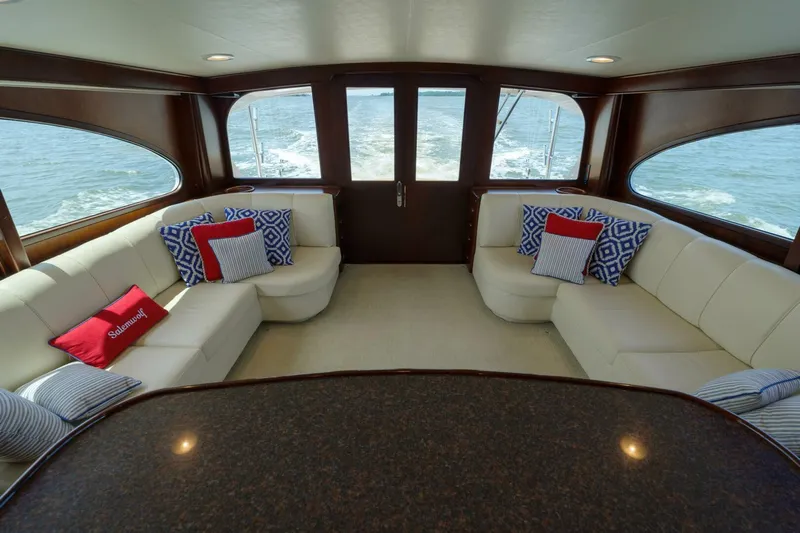 Salemwolf Yacht Photos Pics Luxurious interior of 2000 Garlington 61 C yacht with elegant seating and ocean view.