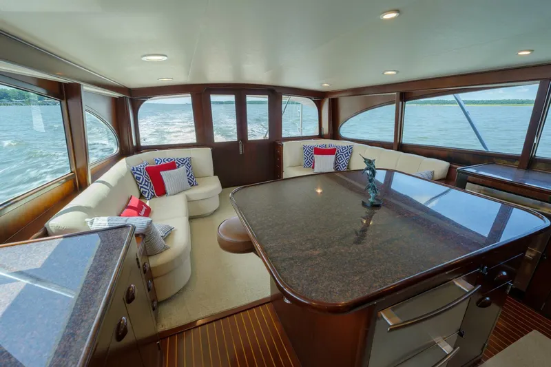 Salemwolf Yacht Photos Pics Luxurious 2000 Garlington 61 C yacht interior with elegant seating and ocean view.