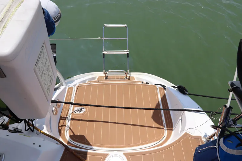  Yacht Photos Pics Lagoon 380 catamaran stern with swim platform and ladder, 2001 model.