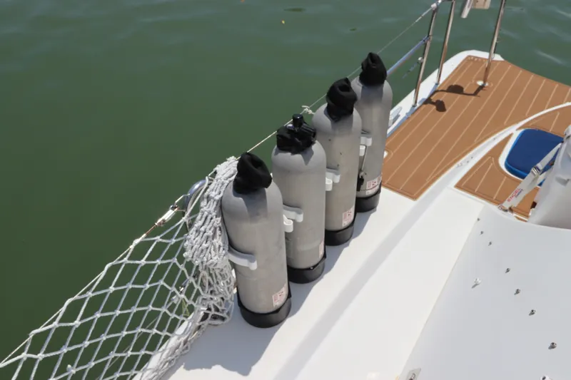  Yacht Photos Pics Four scuba tanks on a 2001 Lagoon 380 catamaran deck.