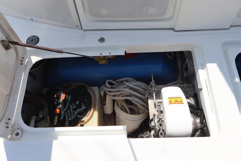  Yacht Photos Pics Storage compartment of a 2001 Lagoon 380 catamaran with ropes and equipment.