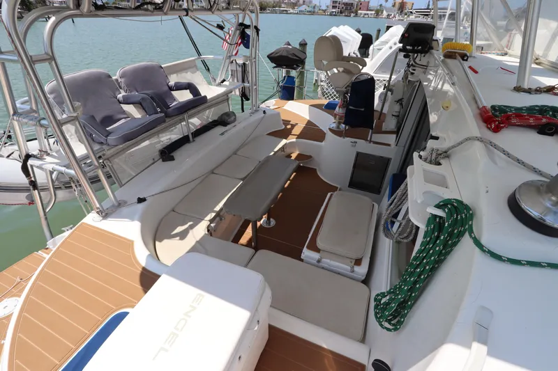  Yacht Photos Pics Lagoon 380 catamaran deck, 2001 model, featuring seating and nautical equipment.