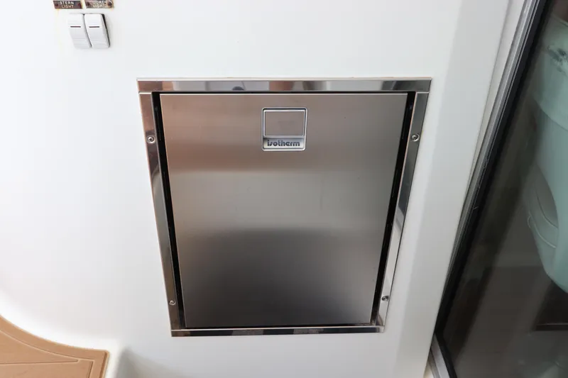  Yacht Photos Pics Stainless steel hatch on 2001 Lagoon 380 catamaran interior.