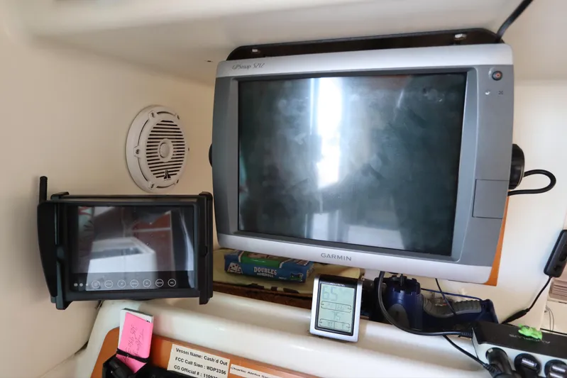  Yacht Photos Pics Navigation equipment on a 2001 Lagoon 380 catamaran, featuring Garmin displays and controls.