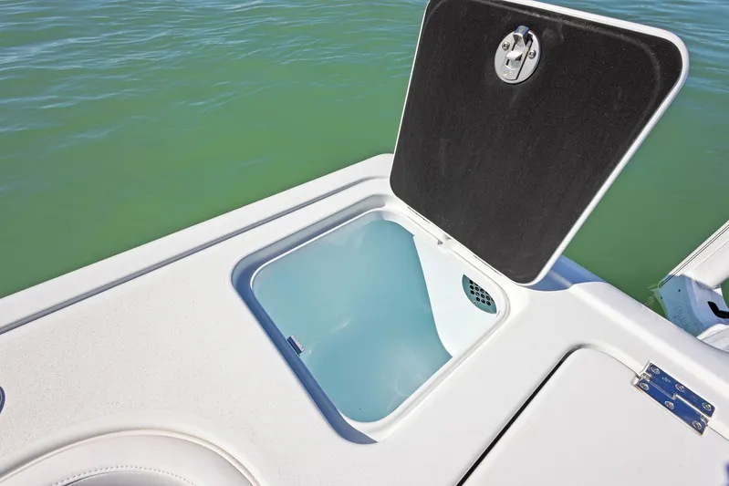  Yacht Photos Pics 2022 Barker Boatworks 26 Open livewell, open lid, on calm water.