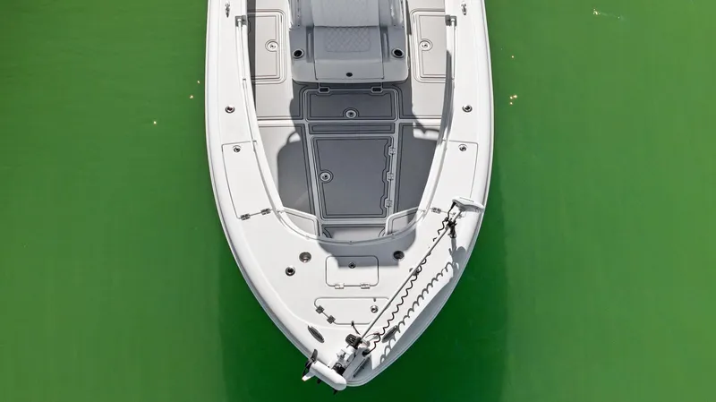  Yacht Photos Pics 2022 Barker Boatworks 26 Open on green water, aerial view.