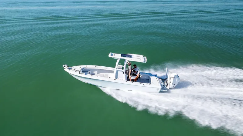  Yacht Photos Pics 2022 Barker Boatworks 26 Open cruising on calm green waters.