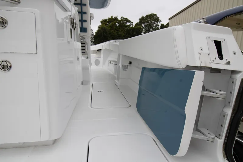  Yacht Photos Pics 2025 HCB 42 Lujo boat interior with sleek white and blue design elements.