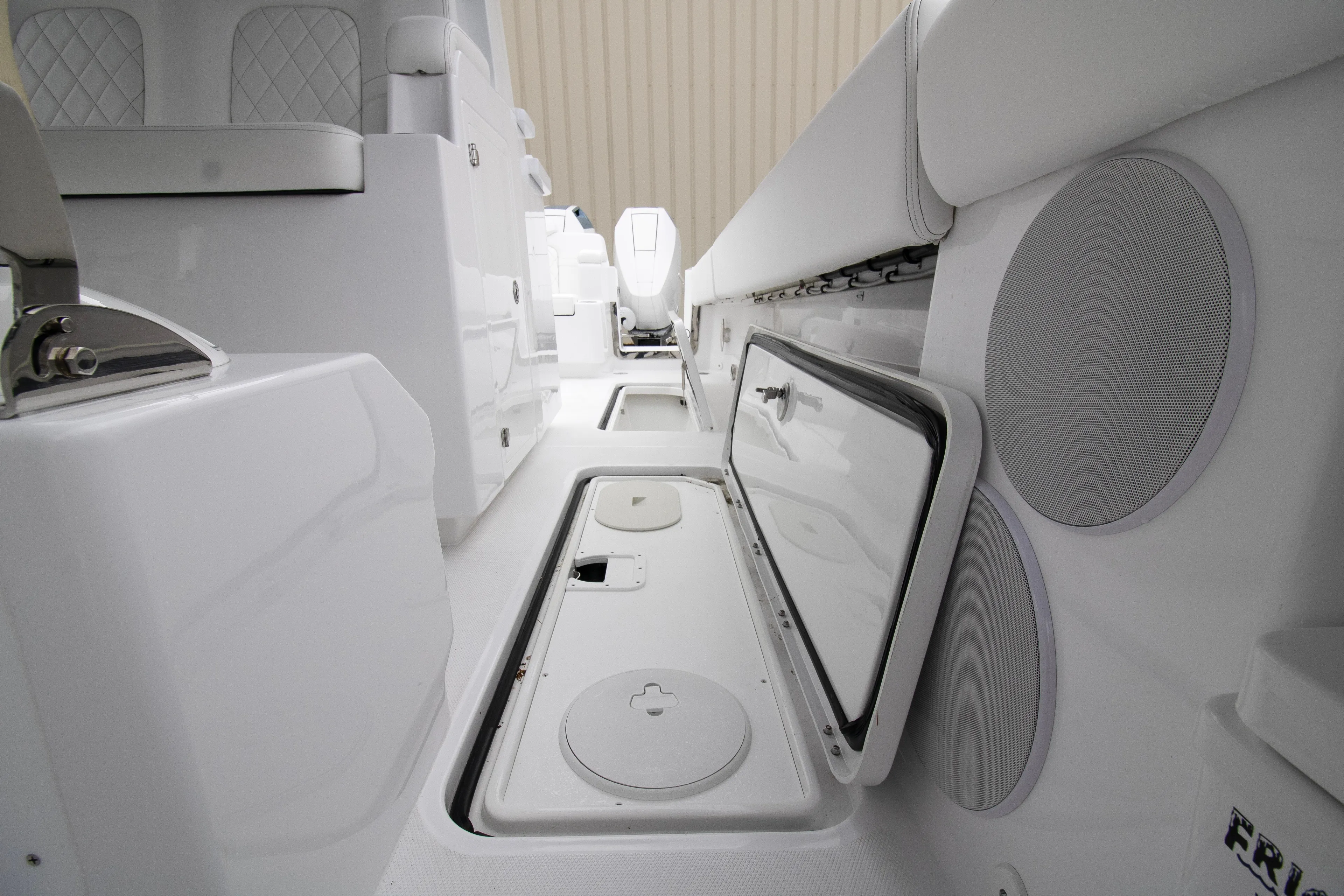  Yacht Photos Pics 2025 HCB 42 Lujo boat interior with open storage compartments and seating.