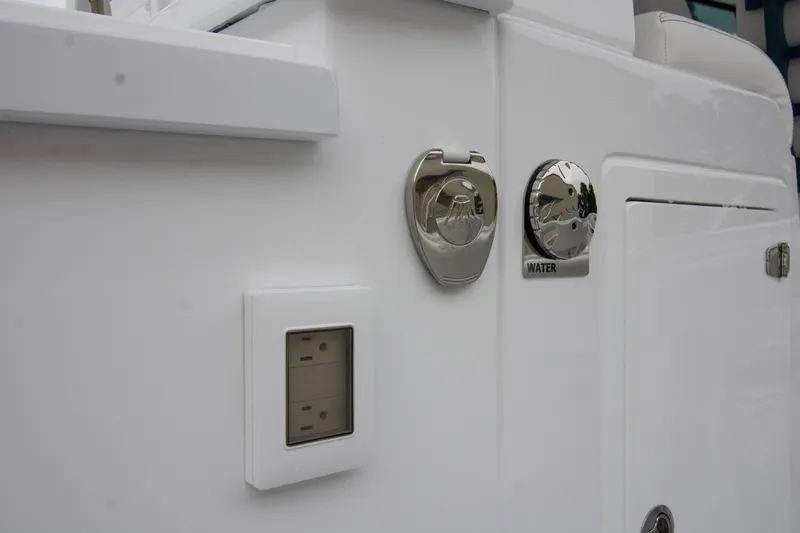  Yacht Photos Pics 2025 HCB 42 Lujo boat detail showing water access and electrical outlet.