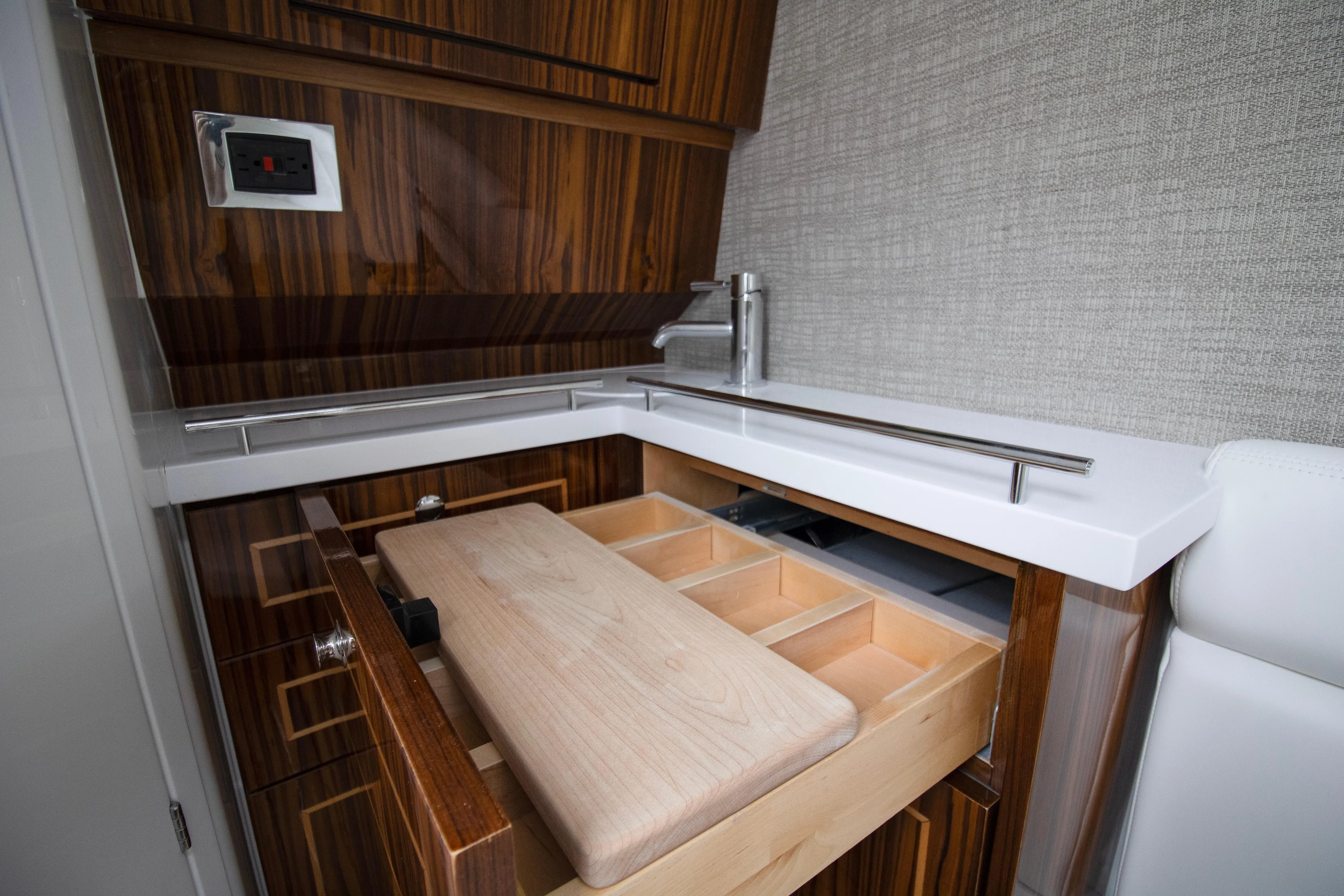 Yacht Photos Pics Interior of 2025 HCB 42 Lujo yacht with open wooden drawer and modern design.