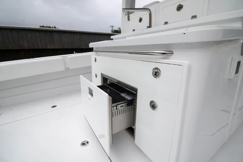  Yacht Photos Pics 2025 HCB 42 Lujo boat interior with open storage compartment.