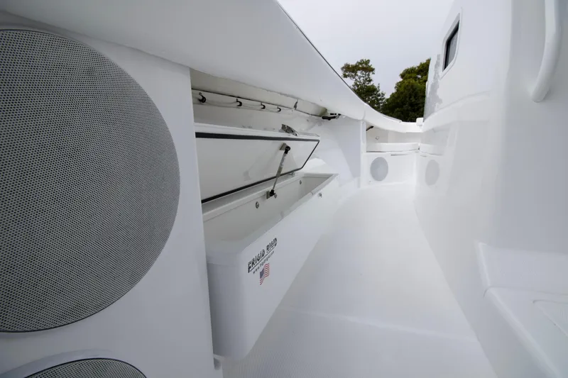  Yacht Photos Pics 2025 HCB 42 Lujo boat interior with sleek white design and storage compartments.