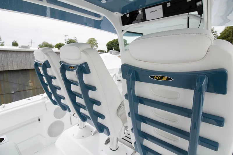  Yacht Photos Pics 2025 HCB 42 Lujo boat seats with blue and white design.