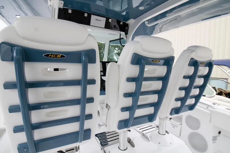  Yacht Photos Pics 2025 HCB 42 Lujo boat seats with blue and white design.