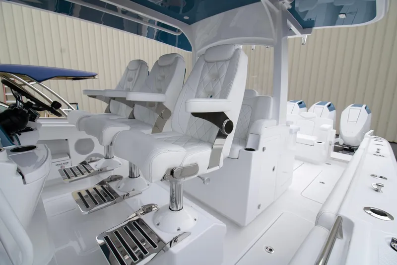  Yacht Photos Pics 2025 HCB 42 Lujo boat interior with luxurious white seating and modern design.