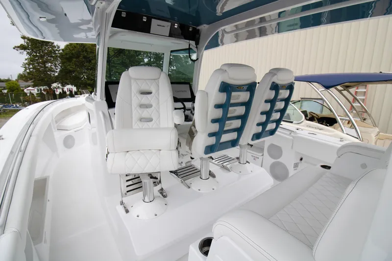  Yacht Photos Pics 2025 HCB 42 Lujo boat interior with luxurious white seating and modern design.