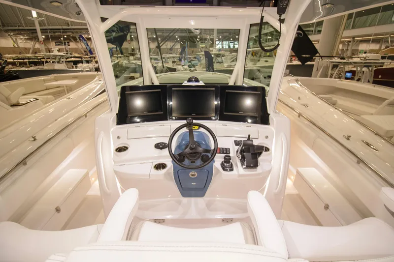  Yacht Photos Pics Helm of 2025 HCB 42 Lujo boat with modern navigation displays.