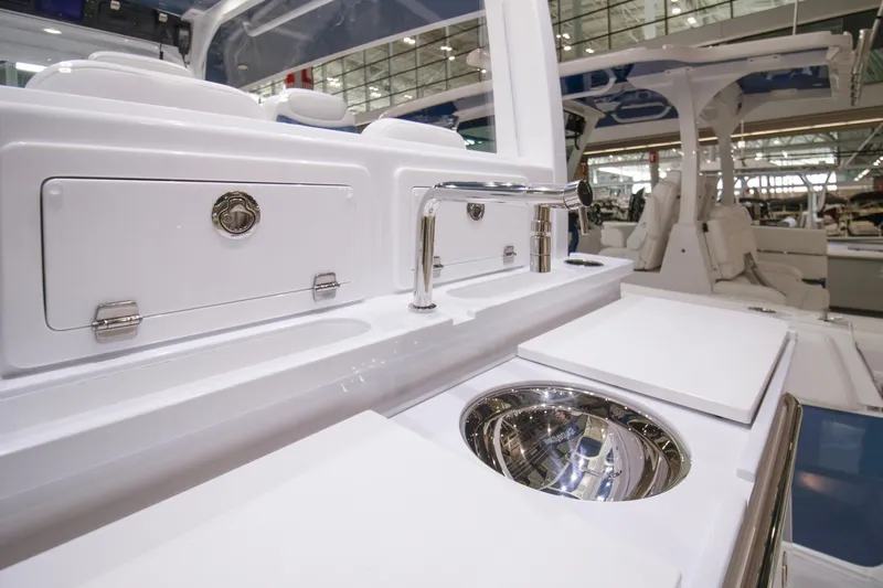  Yacht Photos Pics 2025 HCB 42 Lujo boat interior with sleek sink and storage features.