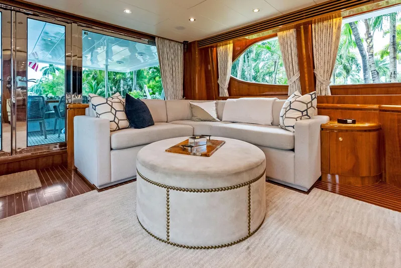 Tortuga Yacht Photos Pics Luxurious Monte Fino 82 yacht interior, featuring elegant seating and stylish decor, 1999 model.