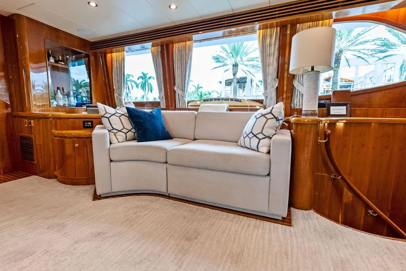 Tortuga Yacht Photos Pics Luxurious Monte Fino 82 yacht interior with elegant sofa and wooden accents, 1999 model.