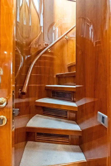 Tortuga Yacht Photos Pics Luxurious wooden staircase inside 1999 Monte Fino 82 yacht.