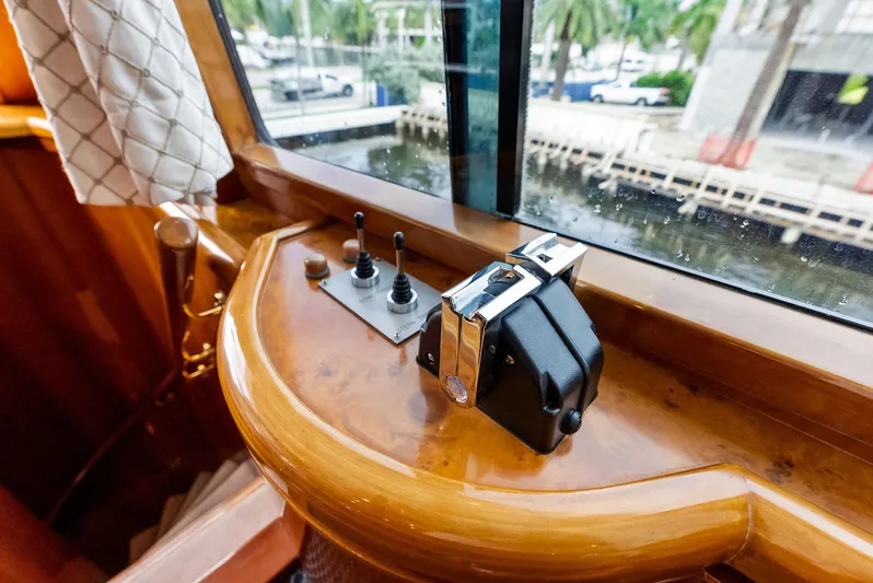 Tortuga Yacht Photos Pics Monte Fino 82 yacht helm controls, 1999 model, with waterfront view.