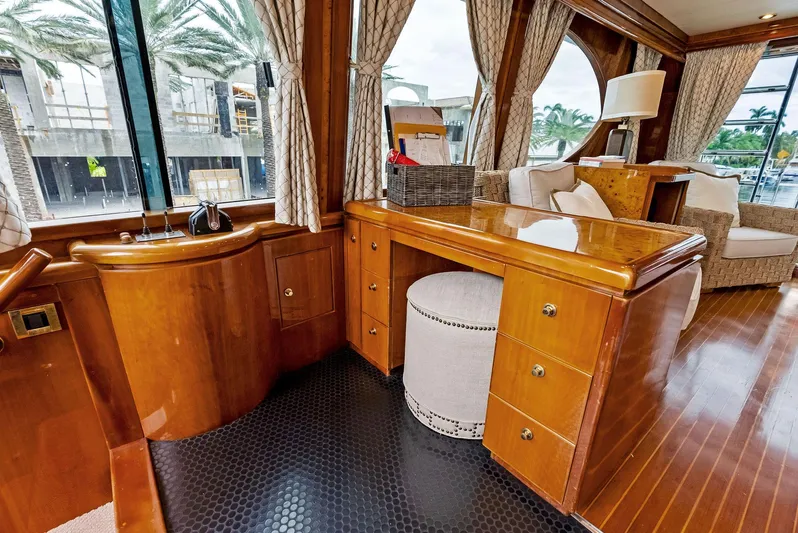 Tortuga Yacht Photos Pics Luxurious interior of 1999 Monte Fino 82 yacht with elegant wood furnishings.