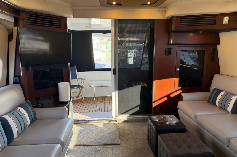  Yacht Photos Pics Luxurious interior of 2006 Sea Ray 44 Sedan Bridge yacht with modern furnishings.